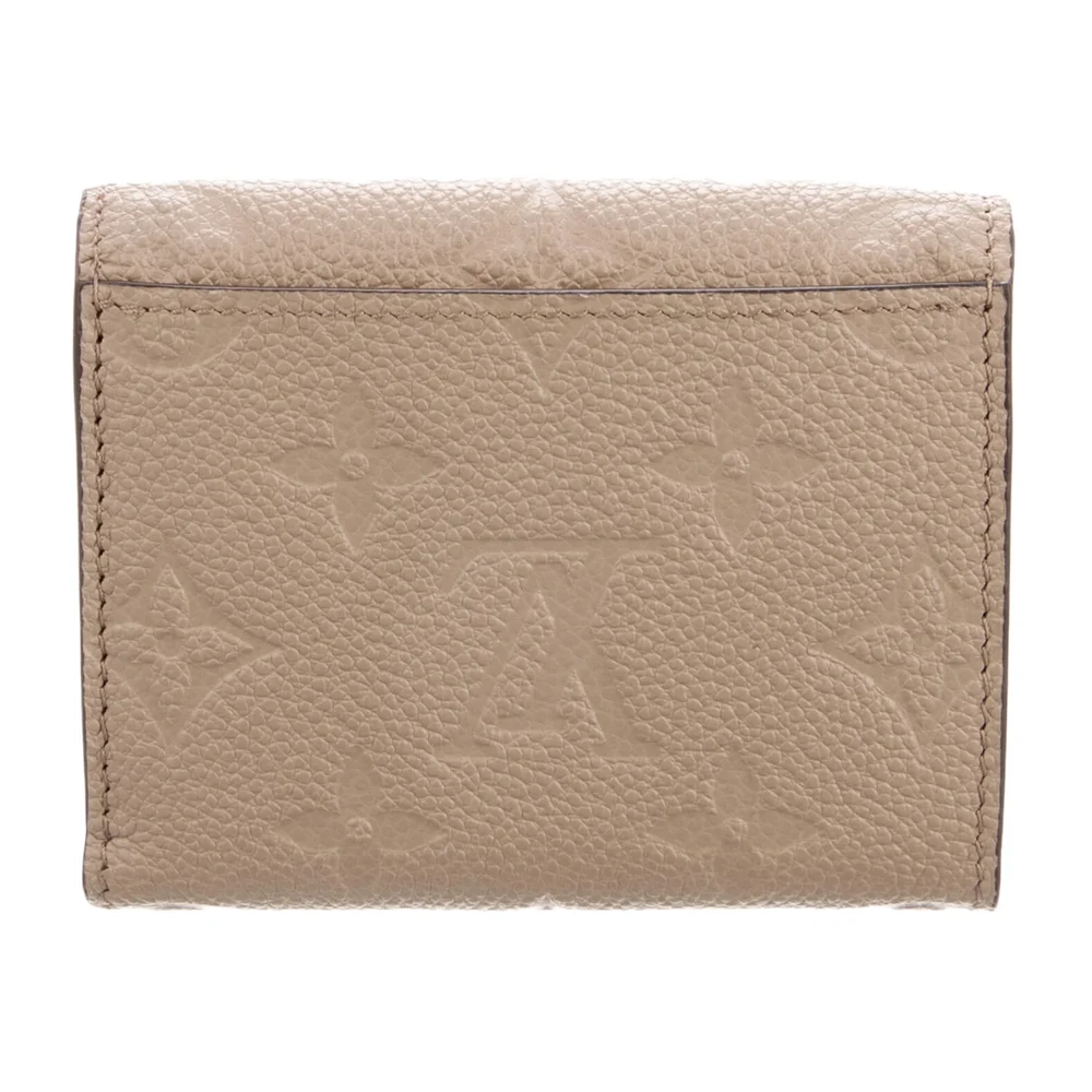 Louis Vuitton Small Zoé Wallet Beige Empreinte Leather Brass Hardware