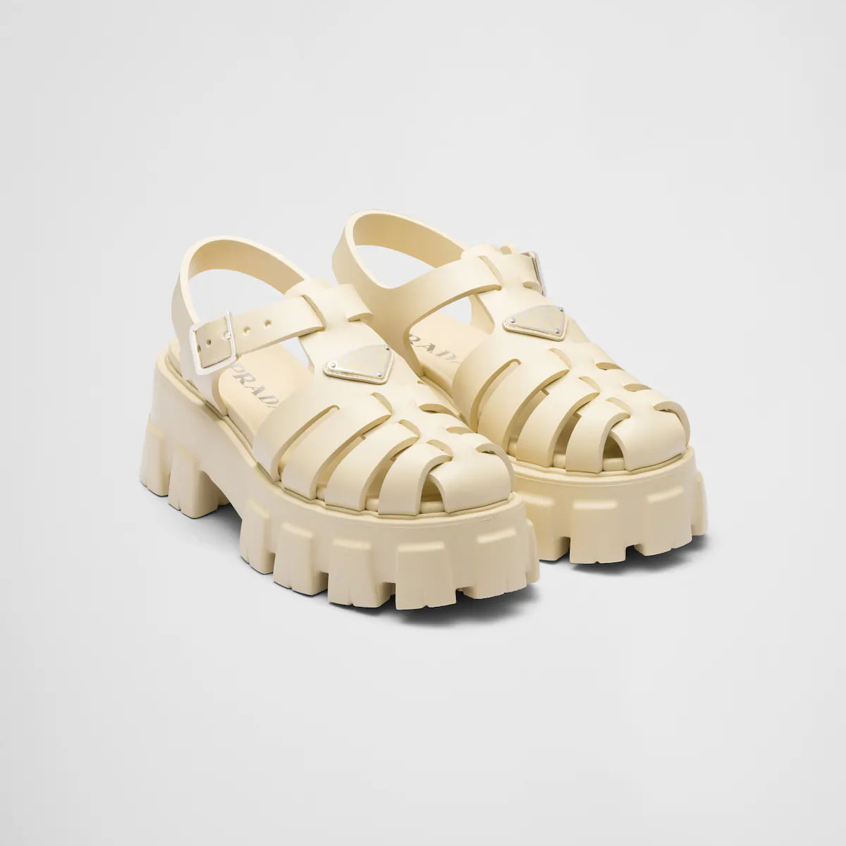 PRADA Quartz colored rubber Monolith sandals