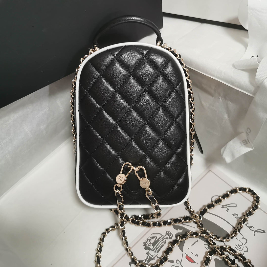 Chanel Black / White Quilted  Lambskin Leather